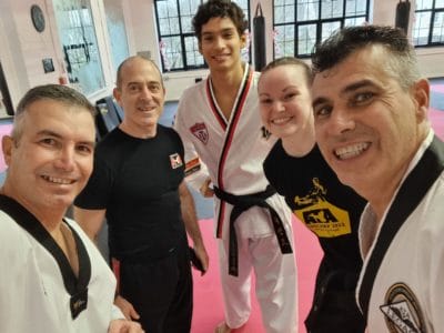 Master Cesar from Star Martial Arts with new friends made at a weekend of martial arts!