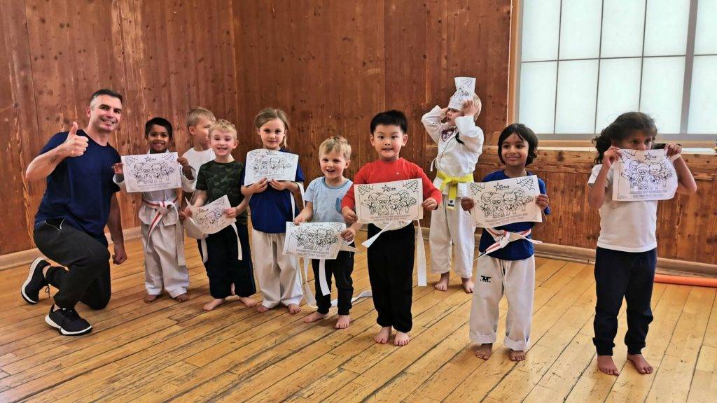 Star Martial Arts (Milton Keynes) Tigers at Taekwondo Club ready to colour their superhero pictures