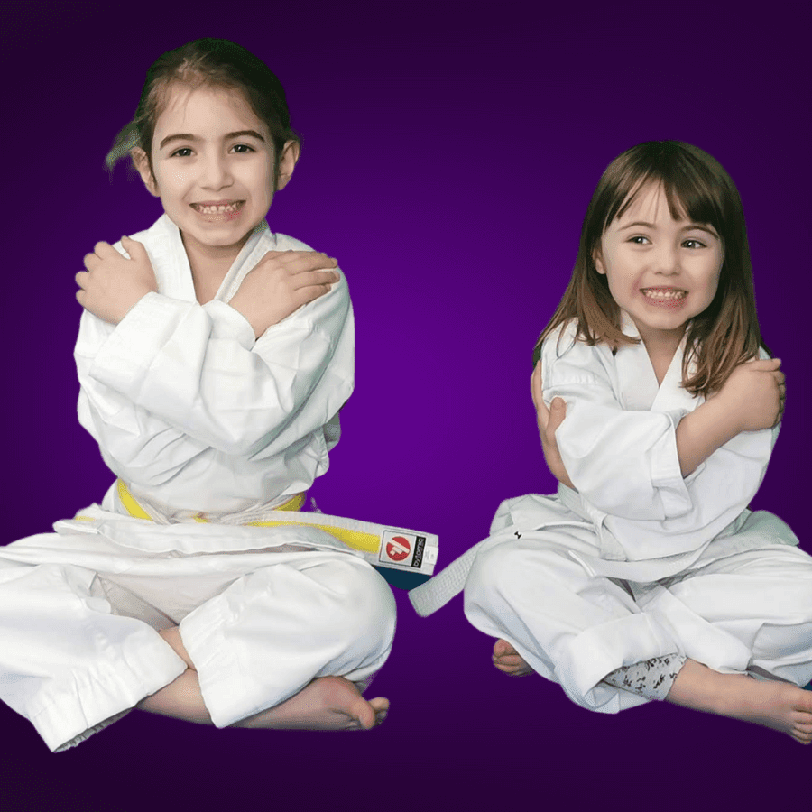 2 Taekwondo girls from Star Martial Arts in Milton Keynes embracing the clubs philosophy of Live-Love-Laugh-Learn!